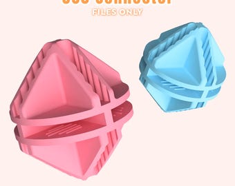 May include: Two 3D-printed connectors, one pink and one light blue, are displayed against a soft background. The connectors are geometric, with a multi-faceted design and a series of parallel ridges. The text "360 Connector FILES ONLY" is at the top.