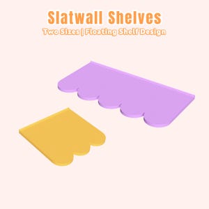May include: Two slatwall shelves are shown. One is light purple, the other yellow. Both have a scalloped edge. The text reads "Slatwall Shelves Two Sizes | Floating Shelf Design". The shelves are designed to be wall-mounted.