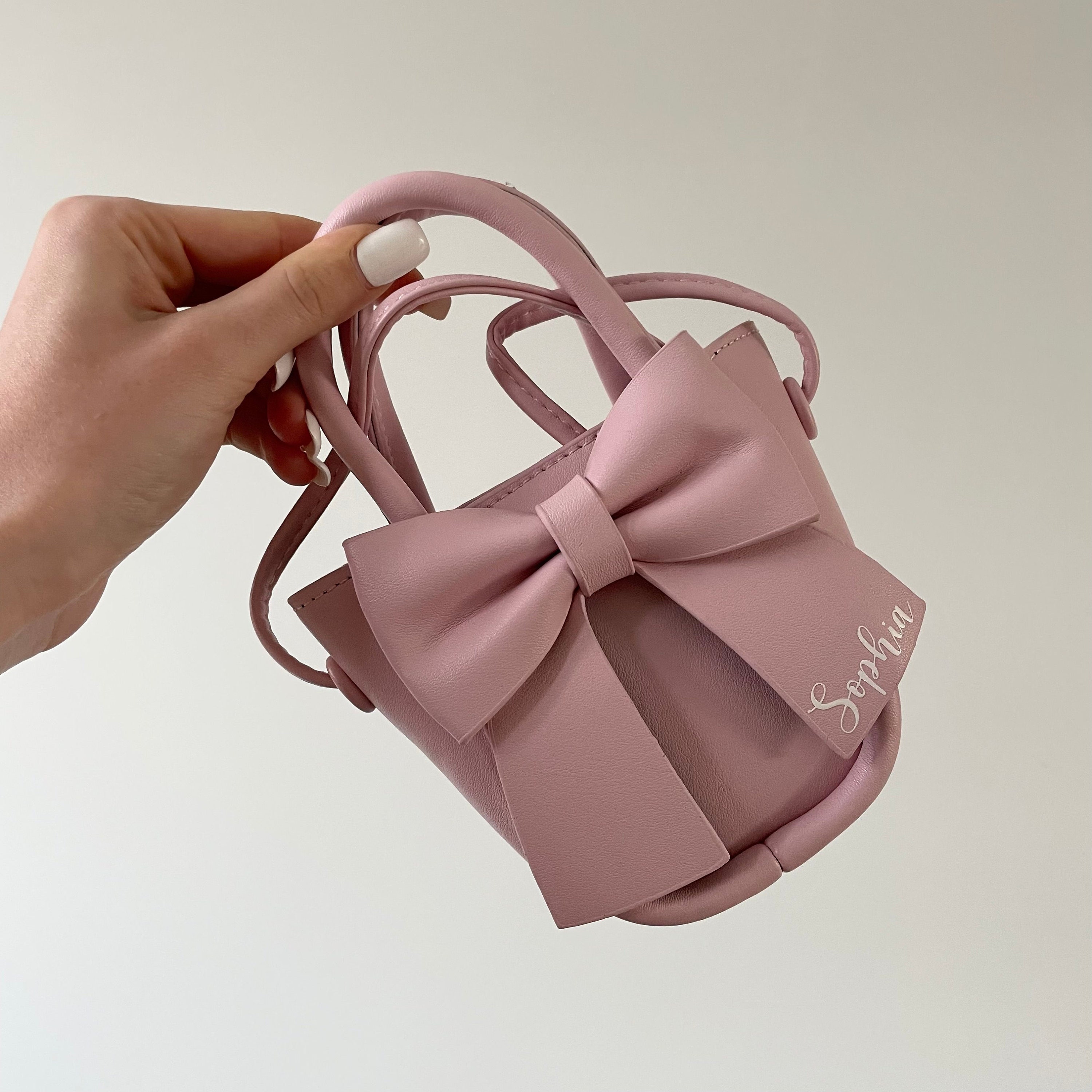 Pink Bow Crossi inferno purse in