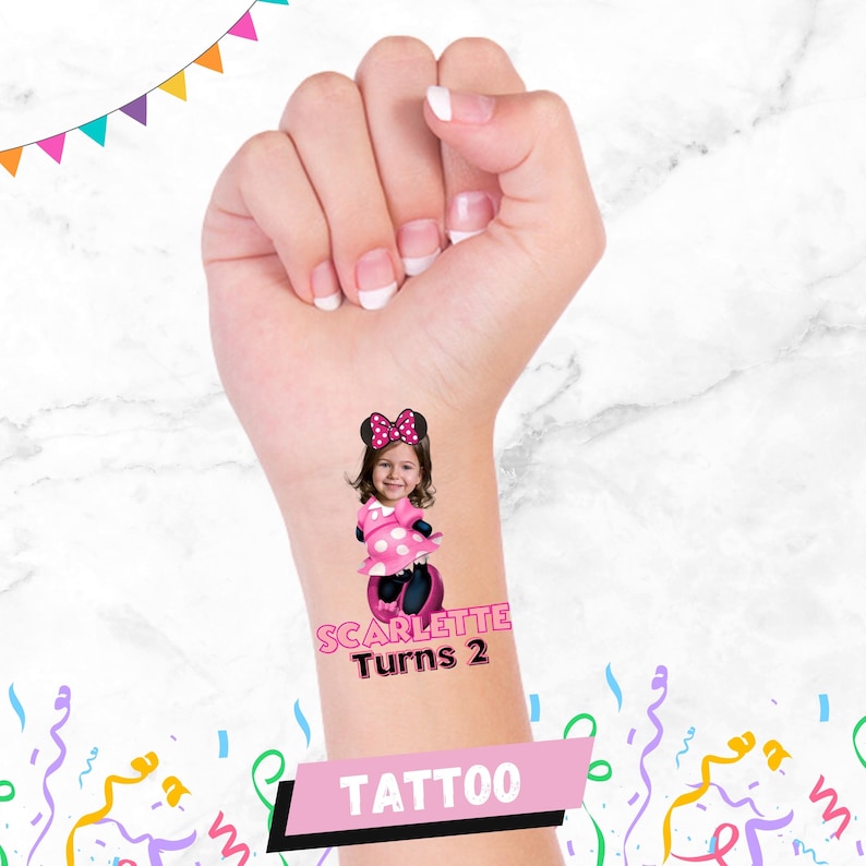 May include: A pink and black temporary tattoo with a photo of a girl dressed as Minnie Mouse. The tattoo says "SCARLETTE Turns 2" and "TATTOO" at the bottom.