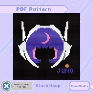 May include: A cross-stitch pattern featuring a purple and pink design on a black background. The design includes a crescent moon and a stylized face. The text "PDF Pattern" is at the top, and "JUNO" is at the bottom. The pattern is designed for a 6-inch hoop.