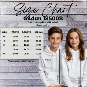 May include: Size chart for a youth hooded sweatshirt in sizes XS to XL. The chart shows the width, length, and sleeve length in inches. The chart is on a woodgrain background.