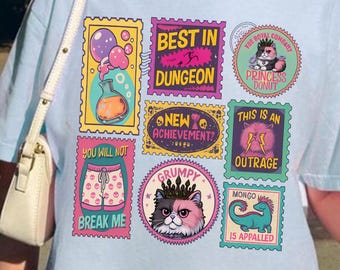 ライド・オア・ロアTシャツ、ダンジョン・クローラー カールのブックスタンプ、新アチーブメントクルーネック、プリンセス・ドーナツ＆モンゴ、Booktokのブックシリーズアパレル