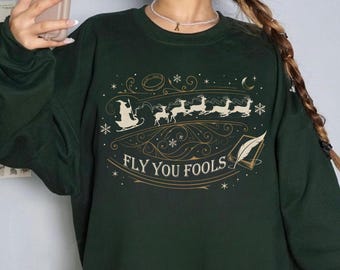 Camiseta "Fly You Fools", reno navideño con trineo de Papá Noel, suéter navideño, regalo navideño, divertida camiseta navideña LORT