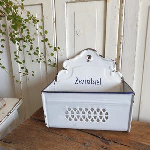 old wall container for onions, antique enamel wall holder, storage shelf, kitchen utensils, brocante kitchen decoration, country house, shabby chic