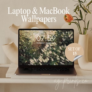 以下が含まれることがあります： 07:59の時刻が表示された、自然をテーマにした壁紙を表示するラップトップ。画面には、緑と白の花柄のデザインが表示されています。「Laptop & MacBook Wallpapers」というテキストが上部にあります。「SET OF 15」と書かれたステッカー。右側には花瓶と花があります。