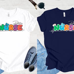Kinderpflegerin T-Shirt | Niedliches RN Tee für Kids Nurse | Nurse Shirt | Pädiatrisches medizinisches Personal Geschenk | Nurse Life Graphic Tee