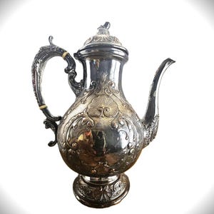 May include: A set of three ceramic mugs with a speckled, matte finish. Each mug features a different color: light blue, cream, and gray. The mugs have a simple, modern design and a comfortable handle.