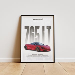 May include: Framed poster featuring a red McLaren 765LT sports car. The poster has the McLaren logo at the top, with the car's model name in large, bold text. The phrase "PRECISION REDEFINED" is at the bottom.