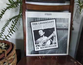 Woody Guthrie in Memorandum used vintage vinyl
