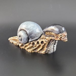 Snail alien statuette