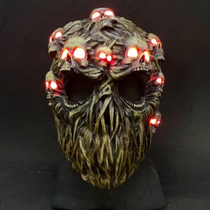 Carnival mask &quot;Noisy&quot;. A scary mask. The mask is illuminated. The skull mask. Halloween mask.