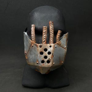 Barrier half mask. A post-apocalyptic mask. Carnival mask. A cosplay mask. A scary mask.