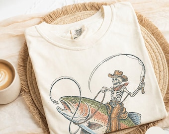 Rainbow Trout Skeleton Cowboy Graphic Tee, Comfort Colors® Shirt, Vintage Trout Shirt, Retro Fish Tee, Spooky Fishing National Park T-Shirt