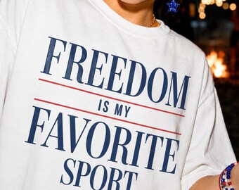 Camiseta Comfort Colors® "La libertad es mi deporte favorito", camiseta patriótica del espectáculo de fuegos artificiales del 4 de julio, camiseta del 4 de julio para ella, camiseta divertida de EE. UU.