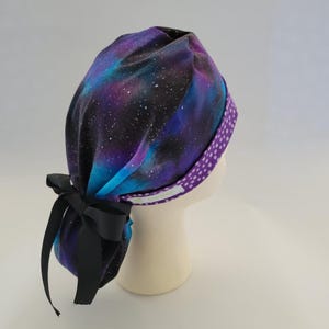 Ponytail Hat by BrightCaps Black Purple Blue with contrasting purple polka dot headband