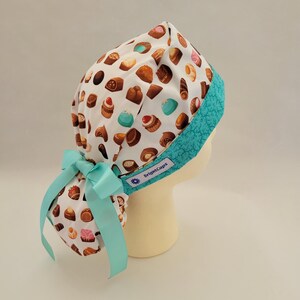 Ponytail Surgical Hat by BrightCaps, Assorted Candy with Turquoise Contrasting Lining