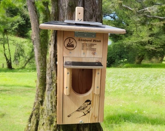 Nest box with camera, solar and battery half cave