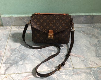 Louis Vuitton Pochette Metis Monogram Handtasche