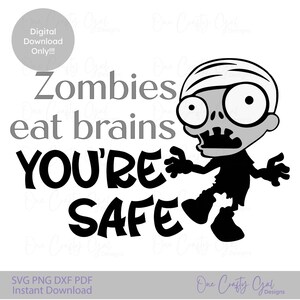 May include: A black and white graphic featuring a cartoon zombie with the text "Zombies eat brains YOU'RE SAFE." The design includes the words "Digital Download Only!!!" and "SVG PNG DXF PDF Instant Download."