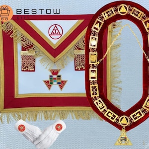 May include: A Masonic apron, collar, and gloves set. The apron is white with red trim and gold fringe, featuring a central emblem. The collar is red velvet with gold-colored metal links. White gloves with red emblems complete the set. The image includes the text "BESTOW GIFT".