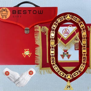 May include: A red presentation folder with the text "BESTOW GIFT" and a gold emblem, alongside a red and gold ceremonial collar, apron, and white gloves with red emblems. The items are likely for a fraternal organization.