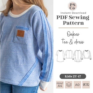 May include: A PDF sewing pattern for a kids' Oakes tee and dress. The pattern includes instructions for sizes 2T-17. The pattern can be printed on A4 or AO paper.