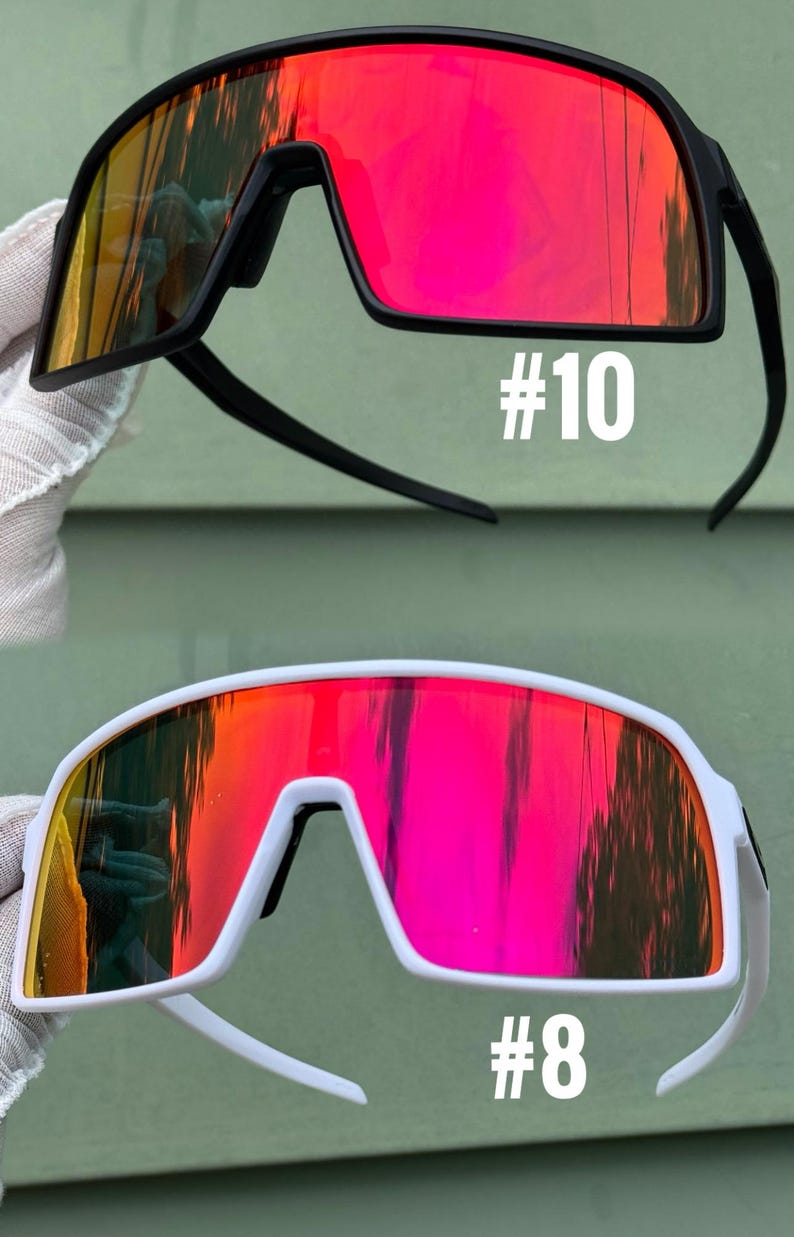 May include: Two pairs of sports sunglasses with mirrored lenses. One pair has a black frame with red and yellow lenses, the other has a white frame with red and yellow lenses. The number "#10" and "#8" are printed on the lenses.
