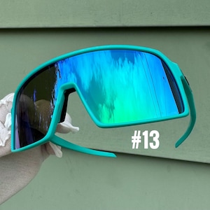 Högpresterande unisex sportglasögon med omlottfunktion. UV-skyddande sportsolglasögon. Sportcykelsolglasögon.