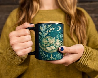 Cozy Cat Mug, Witchy Book Lover Gift, Black Ceramic Coffee Mug with Sleeping Cat, Moon and Stars, Mystical Tea Mug for Readers and Cat Moms