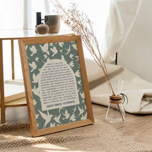 May include: A framed print with a green background and white silhouettes of birds. The print features a quote by Ralph Waldo Emerson: "Write it on your heart that every day is the best day in the year. He is rich who owns the day and no one owns the day who allows it to be invaded with free and aimless  blunders and absurdities. No doubt you have done what you could. Some you cannot forget as soon as you can, tomorrow is a new day. Begin it well and serenely with too much a spirit to be cumbered with your old nonsense. This new day is God dear which is hopes and invitations, go waste a moment on the yesterdays."