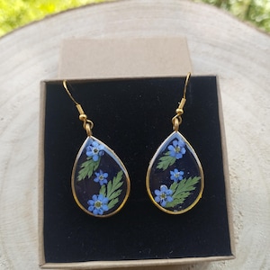 resin earrings with forget-me-not flowers