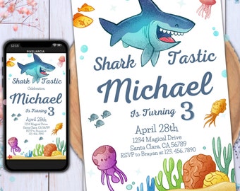 May include: A blue and white shark birthday invitation with the text "Shark Tastic Michael is Turning 3" and details for the party on April 28th. The invitation features a cartoon shark, jellyfish, and other sea creatures.