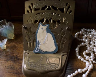 Vinylsticker oranje kat met parels