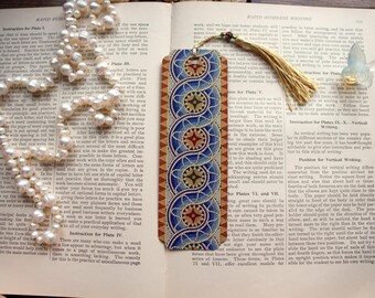 Marcador de mosaico romano con borla de cuentas