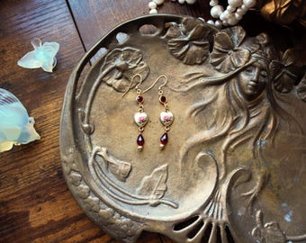 Pendientes de corazón sangrante