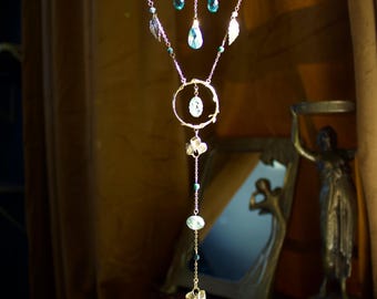 Atrapasol hecho a mano con forma de serpiente del bosque