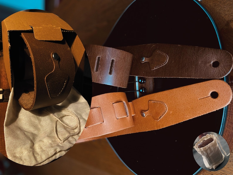 May include: Two leather guitar straps, one brown and one tan, with a brown leather guitar strap in its packaging. The straps have adjustable buckles and are made of high-quality leather.