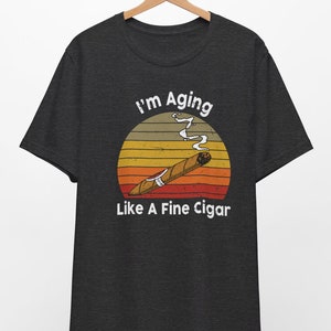 I am aging like a fine cigar shirt,cigar tee,cigar apparel,graphic cigar shirt,graphic tee,graphic apparel,smoking shirt,smoking apparel