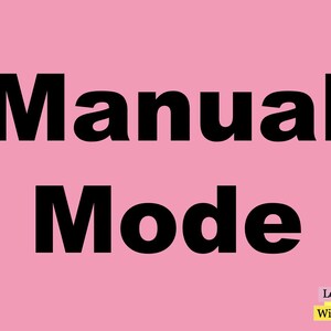 Puede incluir: Un fondo rosa con las palabras "Manual Mode" en letras negras grandes y en negrita. En la esquina inferior derecha, el texto "Learning With V" está en una fuente más pequeña, con un fondo amarillo y morado.