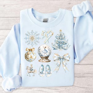 Azul Natal PNG Quebra-nozes Coquete Laço Toile Azul Quebra-nozes Balé Floco de Neve PNG Globo de Neve Ornamento Toile PNG Design de Camisa Frente Completa