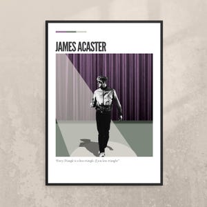 May include: A framed poster featuring James Acaster. The poster has a black frame and a white background. The text "JAMES ACASTER" is at the top. A black and white image of a man is in the center, with a purple curtain backdrop. The quote "Every Triangle is a love triangle, if you love triangles" is at the bottom.