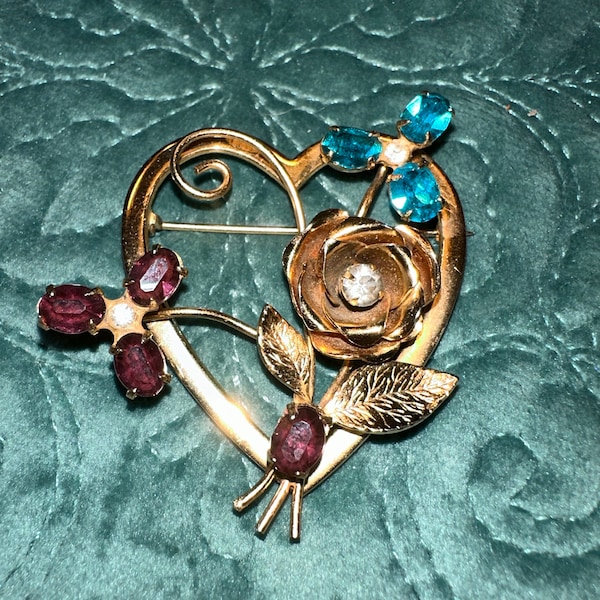 Lovely Coro heart pin with multi colored stones