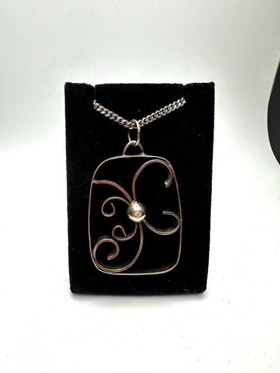 Long sterling silver chain with sterling silver freeform pendant