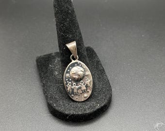 Sterling silver “save the children” world with children pendant