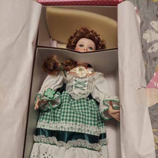 Paradise Galleries musical porcelain doll