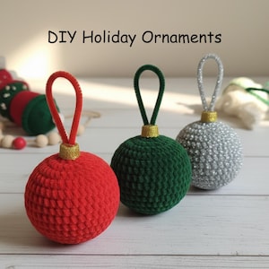 May include: Three handmade Christmas baubles. A red, green, and silver ball-shaped bauble with a loop for hanging. The baubles have a gold-coloured base. The text "DIY Holiday Ornaments" is at the top.