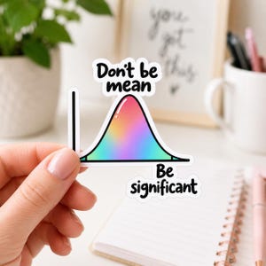 Peut inclure: Un autocollant découpé représentant une courbe en cloche avec un dégradé arc-en-ciel. Le texte au-dessus de la courbe indique Don't be mean et le texte en dessous indique Be significant. Le design inclut un axe vertical noir sur la gauche.