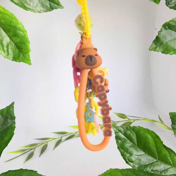 bijou de sac CAPYBARA porte cle animal rongeur marron capybara kawaii unique etoiles tendance accessoire mode cadeau pour elle accessoire