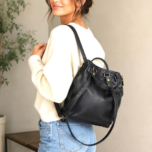 black leather backpack with gold zipper Elio Italian Calfskin in Mezzanotte Villaggio Made in Italy and everything you carry along the way SAGE & HARPER Handmade Raven